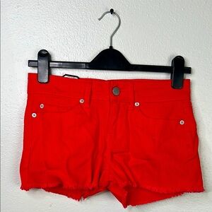 Vibrant Red Jean Shorts with Distressed Hem
